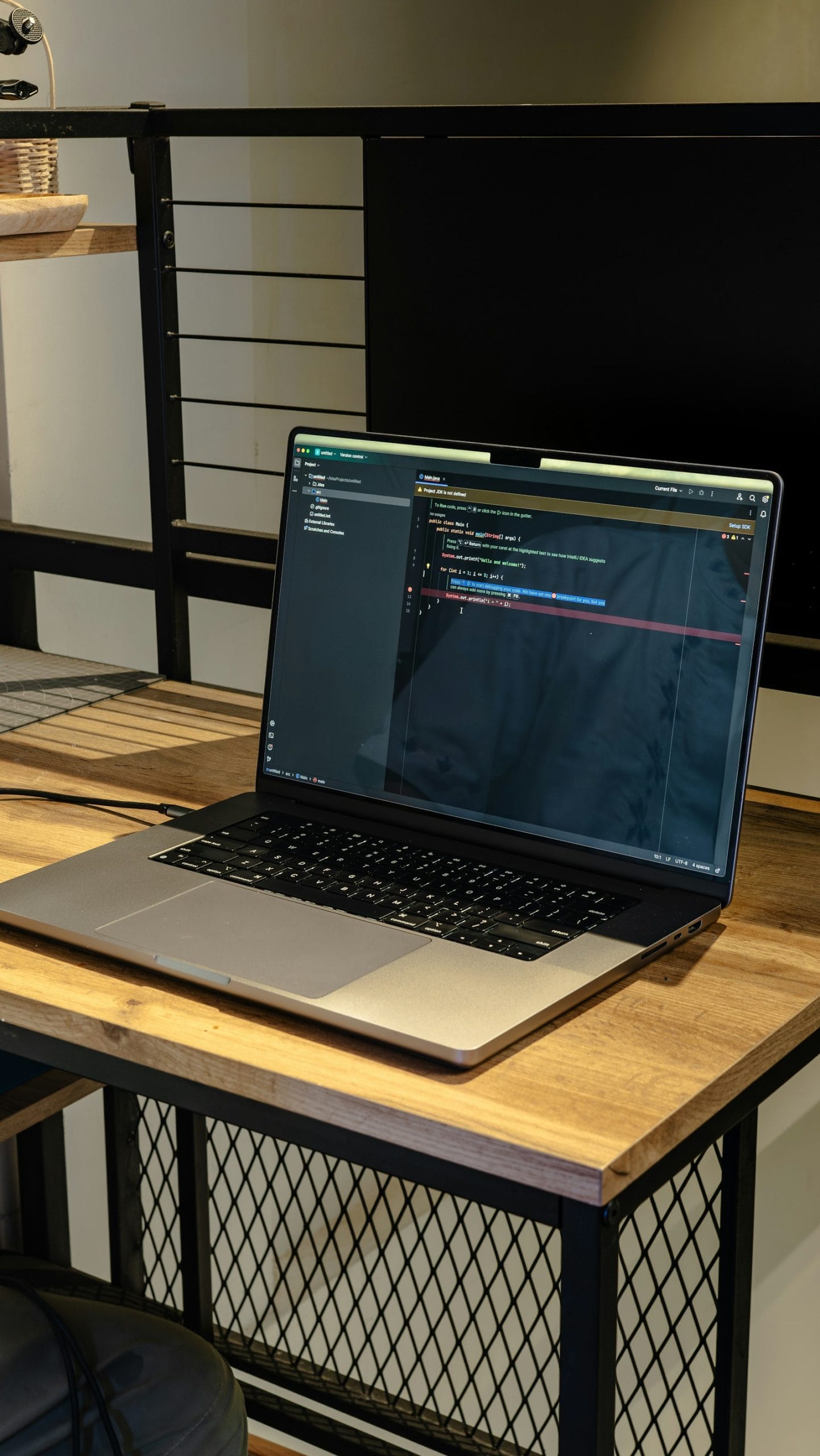 AI coding assistant advanced workflows: developer workspace with multiple monitors showing code refactoring